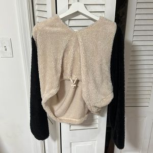 Urban Outfitters cropped, fuzzy, hoodie. Size small. Color: black and tan.